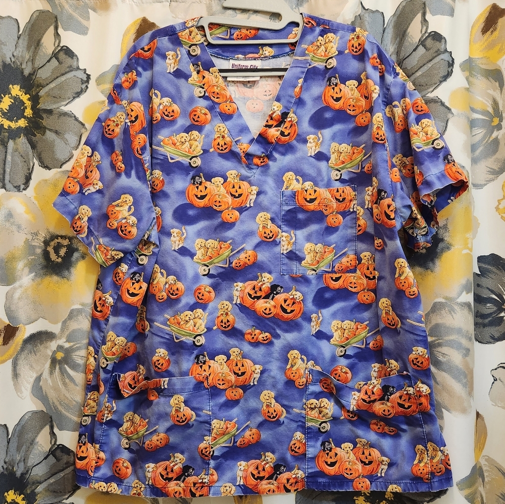 Adorable Uniform City Halloween scrub top! Pumpkins and puppies, so festive!